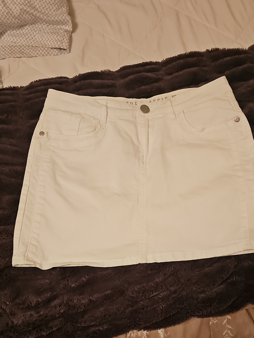 The Classic White Denim Mini Skirt